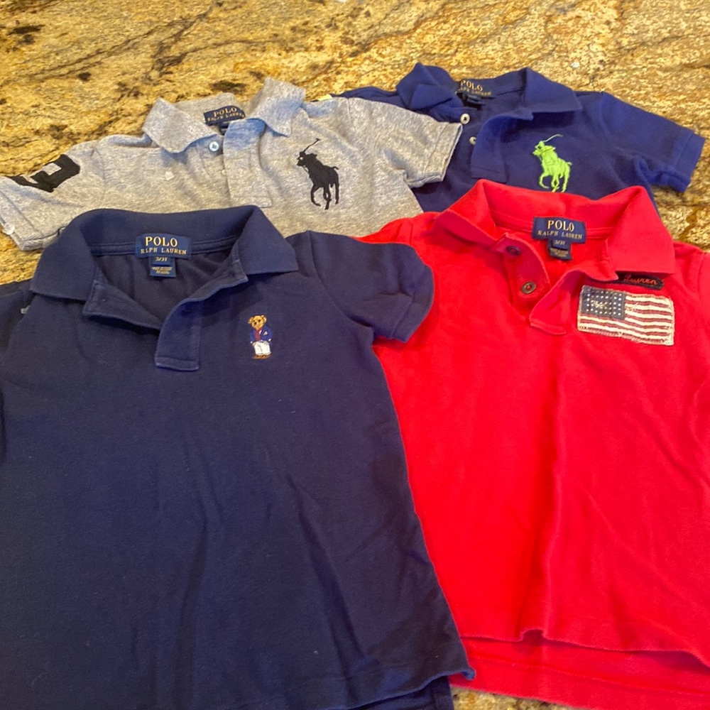 Four Ralph Lauren Polo shirts